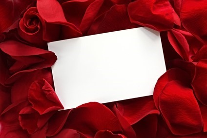 Gift Card on Red Rose Petals